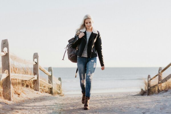 A well dressed woman is walking