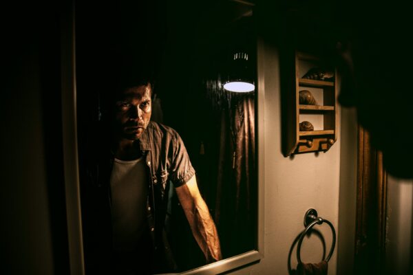 Angry man is seeing in the mirror