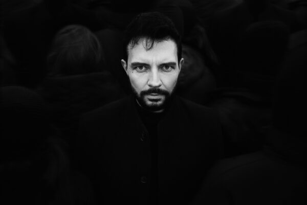 A man with dark background