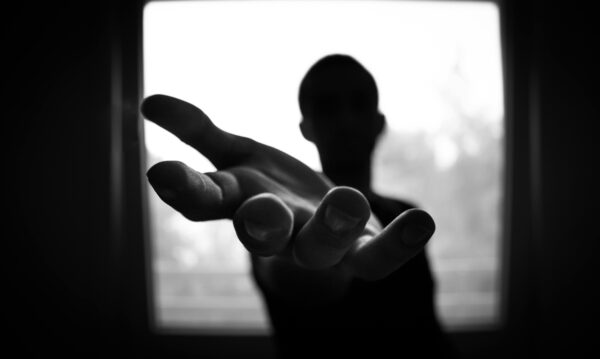 A hand with dark image