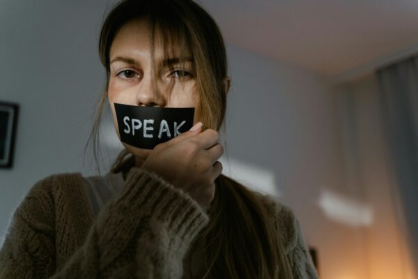 The woman sticked sticker of speak